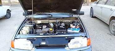 kia cerato satilir: Avtomobil: Lada Samara (VAZ 2114) — hetçbek gövdə tipi, boz rəng. Əsas — 8