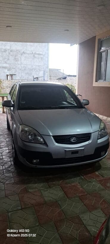 автомобиль фольксваген поло: Kia Rio: 1.4 л | 2006 г. Хэтчбэк — 2