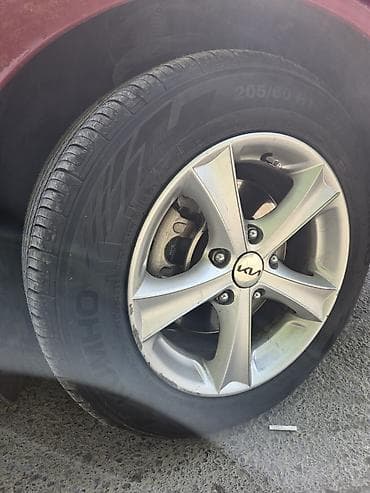 kia optima diffuser: Şin Kumho 205 / 60 / R 15 — 1