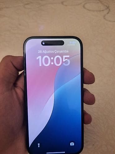 philips xenium e570: IPhone 15, Qara — 1
