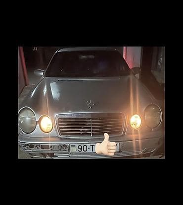 volkswagen tiguan ii: Mercedes-Benz E-Class: 2.2 л | 1997 г. Седан — 1