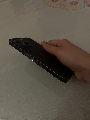 redmi 14 s: IPHONE 14 pro. 80% pil. 256 gb. Hec bir problemi yoxdur. Hec ustada — 1