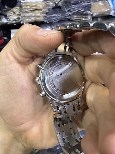 sensor saatlar: Kişi üçün metal qol saatı. Saat klassik və zövqlü dizayna malikdir — 6