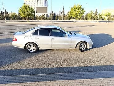 mersedes spoyler: Mercedes-Benz E-Class sedan (W211), gümüşü rəng. Xüsusiyyətlər: - — 5