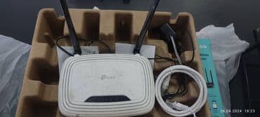 internet klubun icarəsi: Ruter Tp-link sürətli internet modemi satılır.Şəkildə səliqəsiz görünə — 1