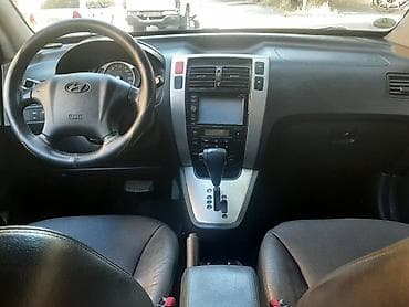 changan uni t: Hyundai Tucson: 2 l | 2007 il Krossover — 7