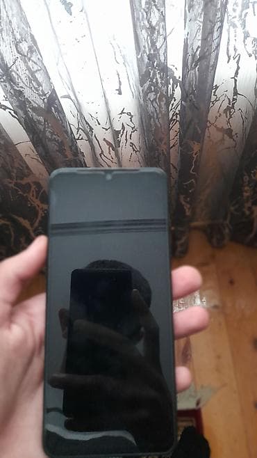 telefon ən ucuz: Smartfon – damcı şəklində ön kamera çıxıntısı olan tam ekranlı model — 3