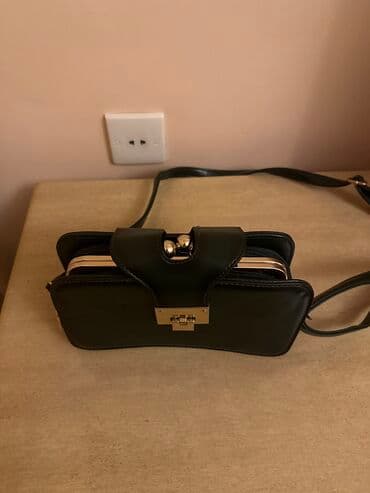 seleme pul verilir 2021: Tund yashil rengli kicik olculu deri canta — 2