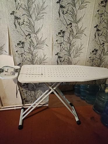 lovhə: Ütüləmə masası – metal korpuslu, geniş və sabit konstruksiya — 1