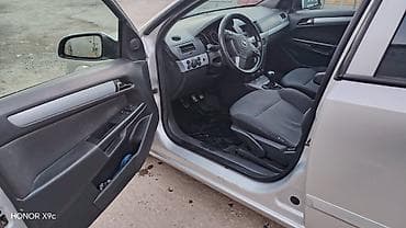 Su nəqliyyatı: Opel Astra: 1.3 l | 2006 il 255000 km Universal — 3