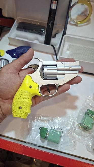 oyuncaql: Oyuncaq Rəngli tapança Xüsusiyyətlər: - Revolver tipli - İstifadə — 2