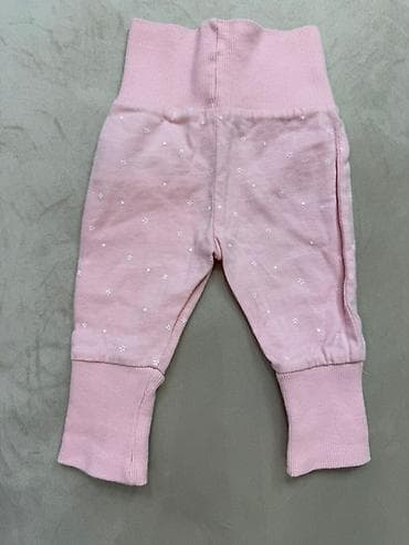 ag cins: Ağ rəngdə, elastik belə malik uşaq şalvarı. Diz nahiyələrində sevimli — 5