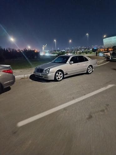 w210 teker: Mercedes-Benz E-Class (W210) sedan – orijinal AMG üslublu 5 çıxışlı — 3