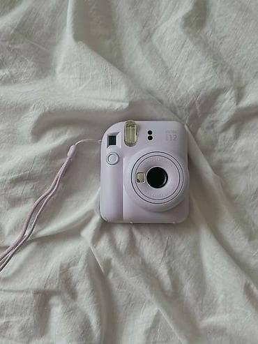 canon printer satilir: Fujifilm Instax Mini 12 ani fotoaparat. Şəkildə açıq çəhrayı rəngdə — 1