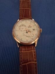 kredite qizil almaq: İşlənmiş, Qol saatı, Orient, rəng - Qızılı — 1