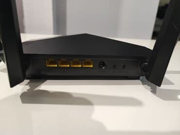 komputer cantasi: Tenda A6C iki diapazonlu Wi‑Fi router. 10 metr kabel hədiyyə — 5