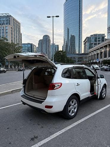 tesla model x: Hyundai Santa Fe: 2.7 l | 2008 il — 3