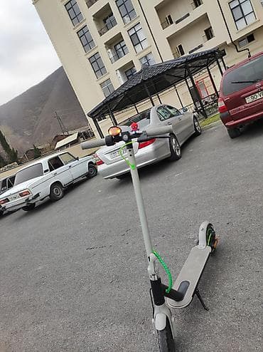Elektrik nəqliyyatı: Elektrik skuter – ağ/gri rəngli, city-commute üçün ideal — 2