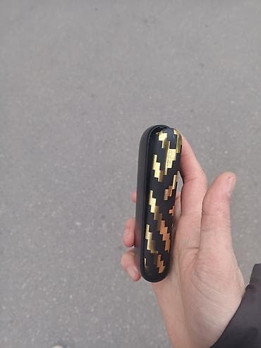 IQOS tütün qızdırma cihazı – şık qara-qızılı dizayn Məhsul təsviri: - — 2