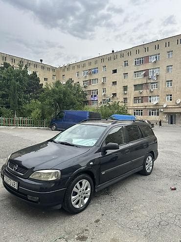 Opel Astra Caravan (Universal) – qara rəng Xüsusiyyətlər: - Kuzov