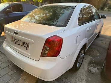 opel tigra 2005: Chevrolet Lacetti: 1.8 l | 2008 il 250000 km Sedan — 2