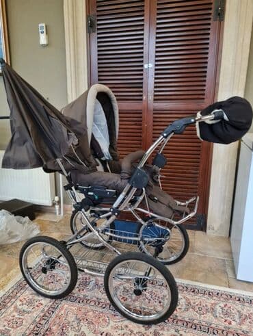 usaq ucun qolbaqlar: Çıxarıla bilən beşikli araba, Yaş: 30 ay — 26