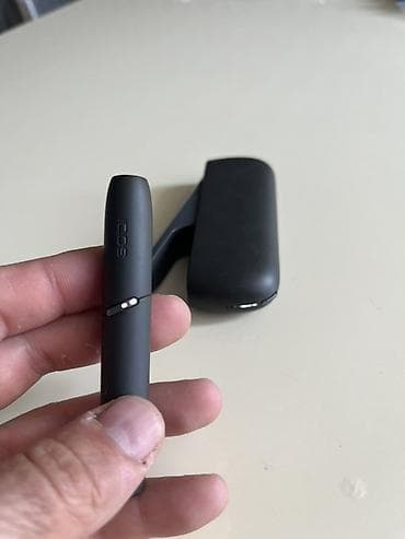 iqos iluma azerbaycan: IQOS 3 DUO heated tobacco cihazı satılır. Şəkillərdə qara rəngli — 2