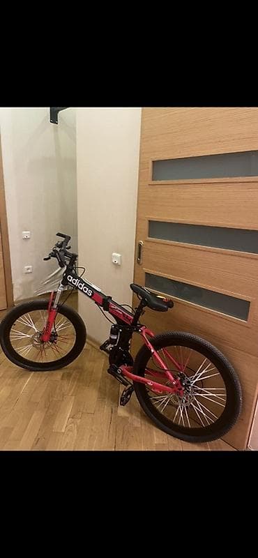 dağ velosiped: Dağ tipli velosiped – qatlanan gövdə - Rəng: qırmızı/qara - Qatlanan — 1