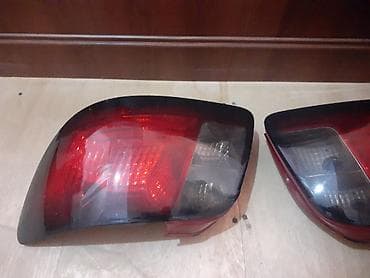 Kia Rio arxa stop kölgə verilmiş sağ yaxşı vəziyyətdədi solda cat var — 1