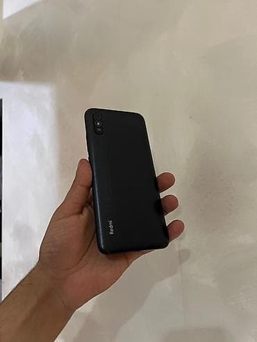 Аудиотехника: Redmi 9T, 64 ГБ, цвет - Черный, Отпечаток пальца — 6