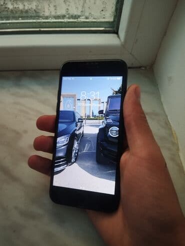 su qizdirici ariston: IPhone 7, 128 GB, Qara, Barmaq izi — 1