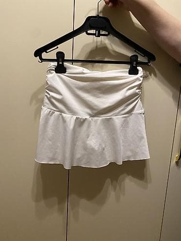 şort: Şortikli yupka .səliqəli geyinilib — 1