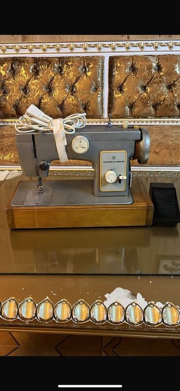 pul daxılı: Dikiş maşını — 1