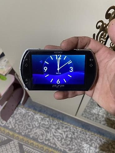 bluetooth qulaqciq: Sony PSP Go portativ oyun konsolu Ustada olmayib zavoddur bilenler — 1