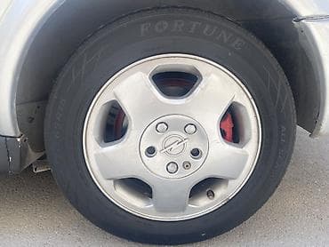 fiat brava 2001: Opel Astra Caravan (universal) – benzinli, avtomatik ötürücülü ailə — 3