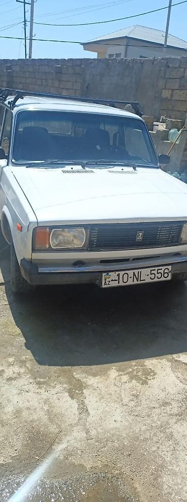 masin lada: Lada (VAZ) 2104 universal, ağ rəng. - Kuzov: 5 qapılı universal, damda — 3