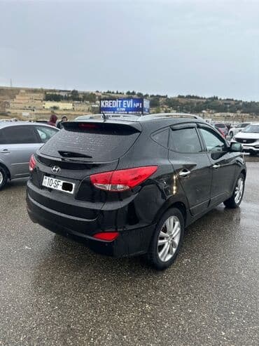 turbo az 06: Hyundai Tuscani: 2 l | 2010 il Krossover — 5