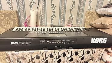 Musiqi alətləri: Korg pa 600 sadə təzə alətdir üstündə ayaqı karopkası çexolu pedalı — 4