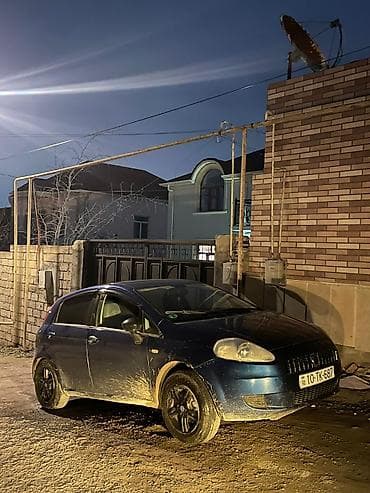 uaz tekerleri: Fiat Grande Punto: 1.3 l | 2006 il Hetçbek — 4