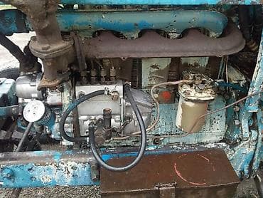ford transit v184: Mavi rəngli təkərli traktor, kabinalı. Kənd təsərrüfatı işləri üçün — 1