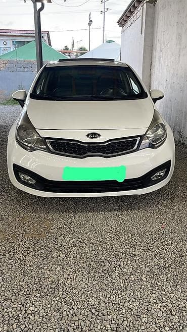07 stop: Kia Rio: 1.4 l | 2012 il Sedan — 1