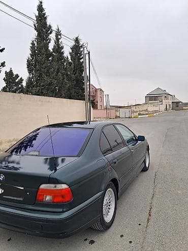 disqi teker mersedes: BMW 5 series: 2.8 l | 1997 il Sedan — 6