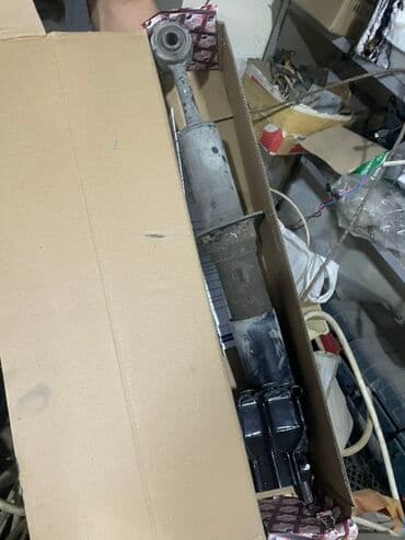 Комбинезоны: Avtomobil üçün ön amortizator dayaq-rakoru (shock absorber strut) — 2