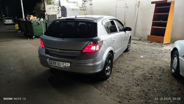 daewoo gentra necə maşındır: Opel Astra H – 5 qapılı hetçbek, gümüşü rəng. - Nömrə: 99 VU 521 - — 1