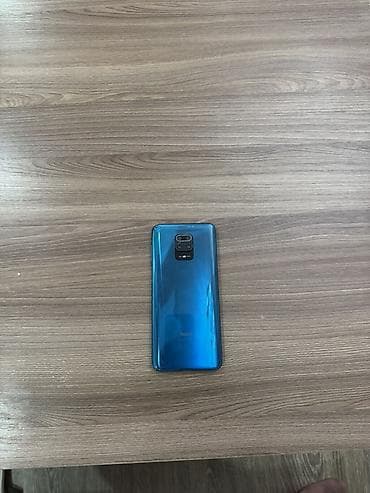 balaca televizor: Xiaomi Redmi (mavi rəngli) smartfon - Arxa tərəf: parlaq mavi şüşə — 3