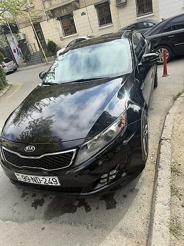 Avtomobil satışı: Kia Optima – qara rəngli, zərif və dinamik sedan. - Korpus: 4 qapılı — 1