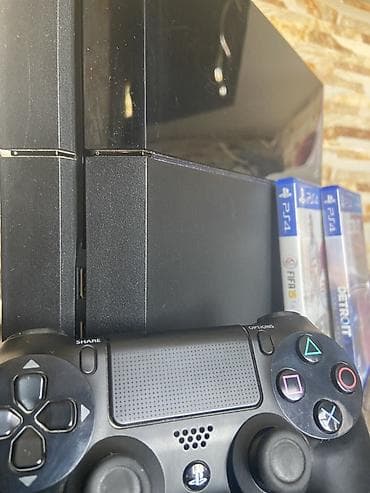 xbox series one: PlayStation 4 (PS4) oyun konsolu – DualShock 4 pultu və iki disk oyunu — 1