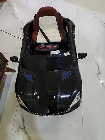 Uşaq geyimi və ayaqqabıları: Uşaq üçün elektrikli miniatür maşın - Korpus: qara rəng, kabriolet — 1