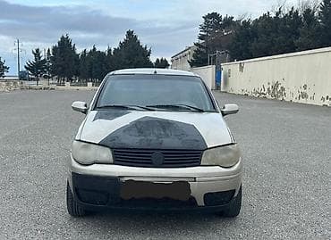 şam diskilər: Fiat Albea sedan - Kuzov: 4 qapılı sedan, bej rəng (bəzı hissələrdə — 1