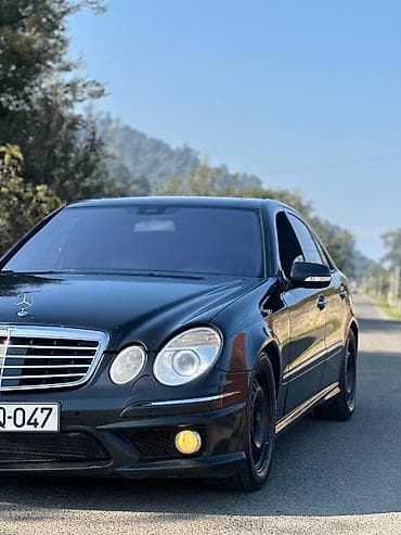 arxa spoyler: Mercedes-Benz E 320: 3.2 l | 2004 il Sedan — 3